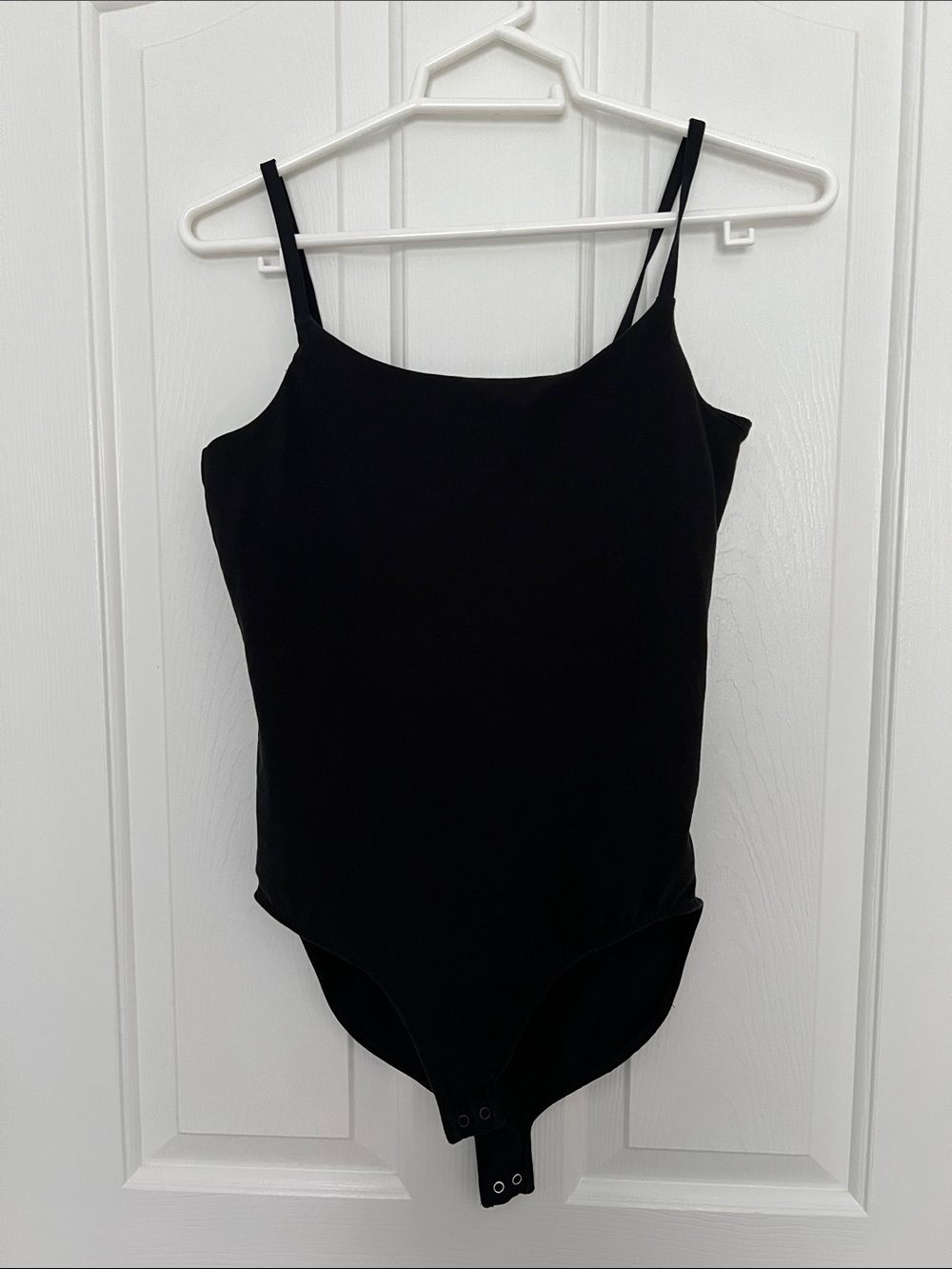 Black One-Piece Bodysuit with Snap Closure